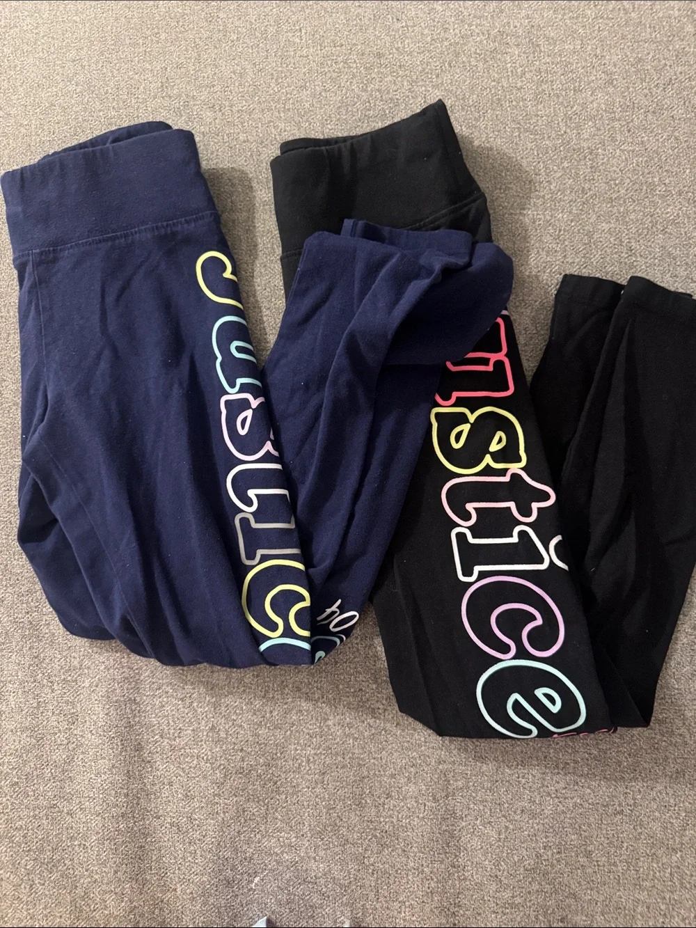 5/$15- Justice Girls' Navy & Black Logo Leggings with Neon Outline